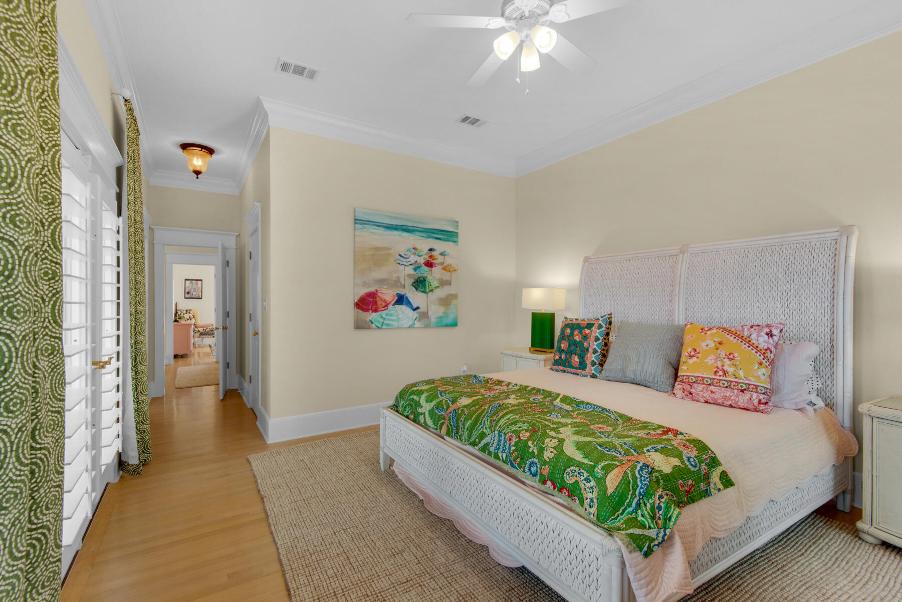 61 Rue Caribe Miramar Beach, FL 32550 - Photo 25 of 69 a bedroom with a bed and a chandelier