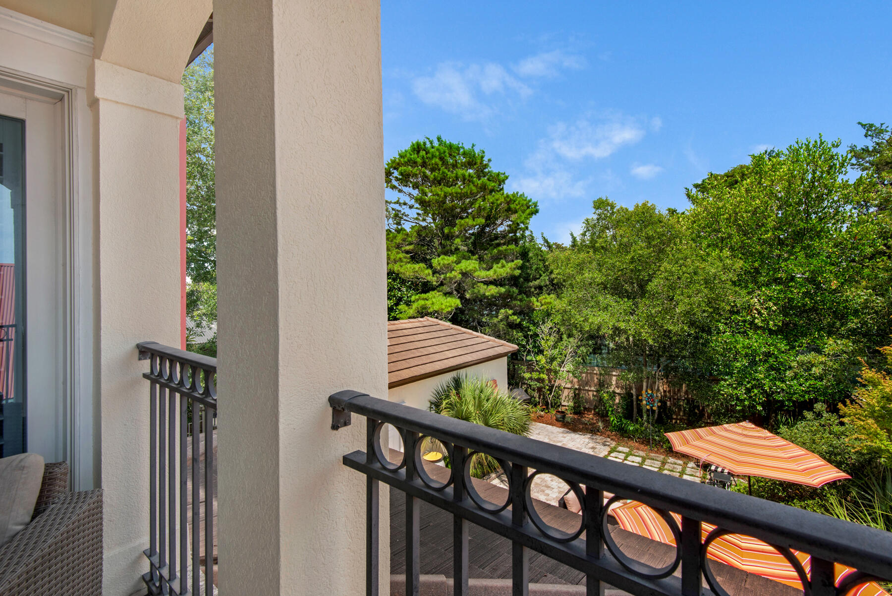 61 Rue Caribe Miramar Beach, FL 32550 - Photo 29 of 69 a view of a balcony with wooden floor and fence