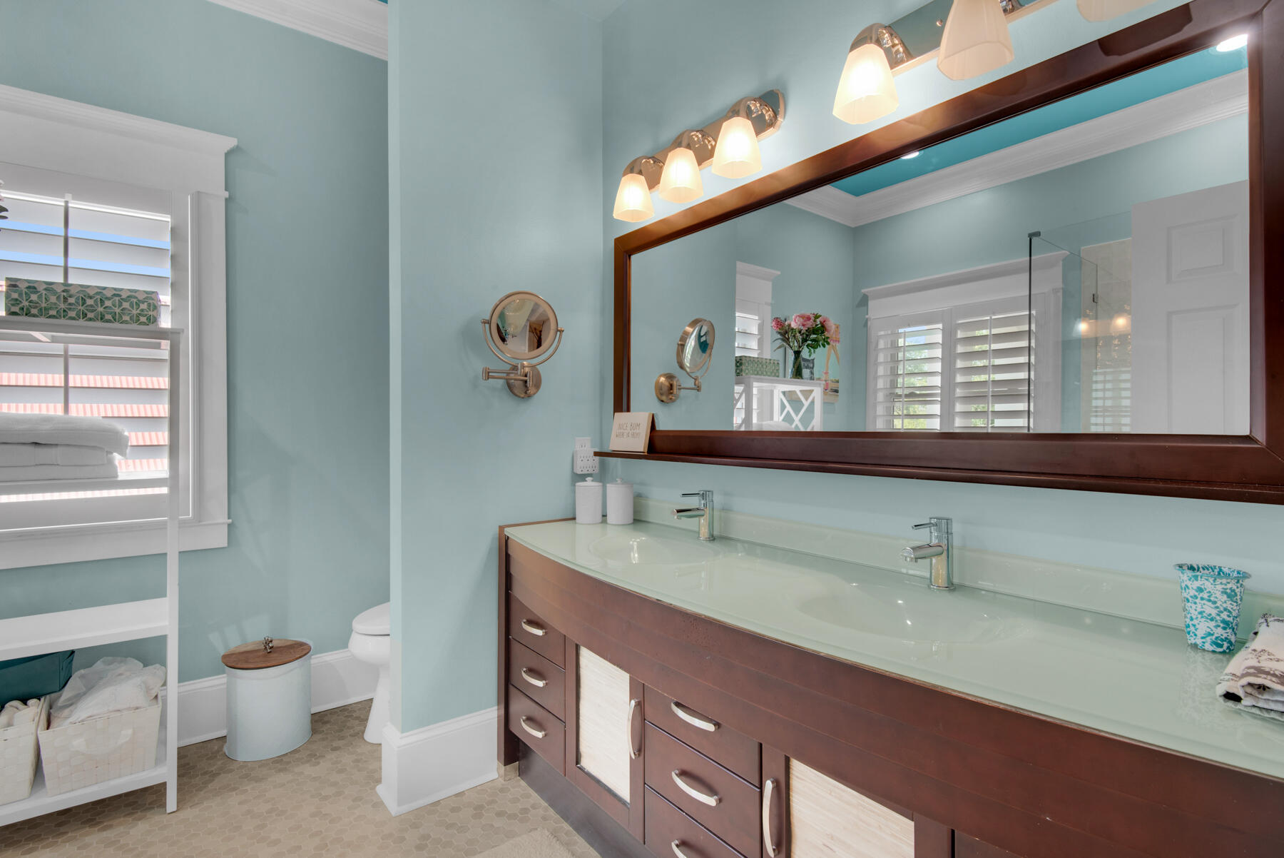 61 Rue Caribe Miramar Beach, FL 32550 - Photo 30 of 69 a bathroom with a sink and a mirror