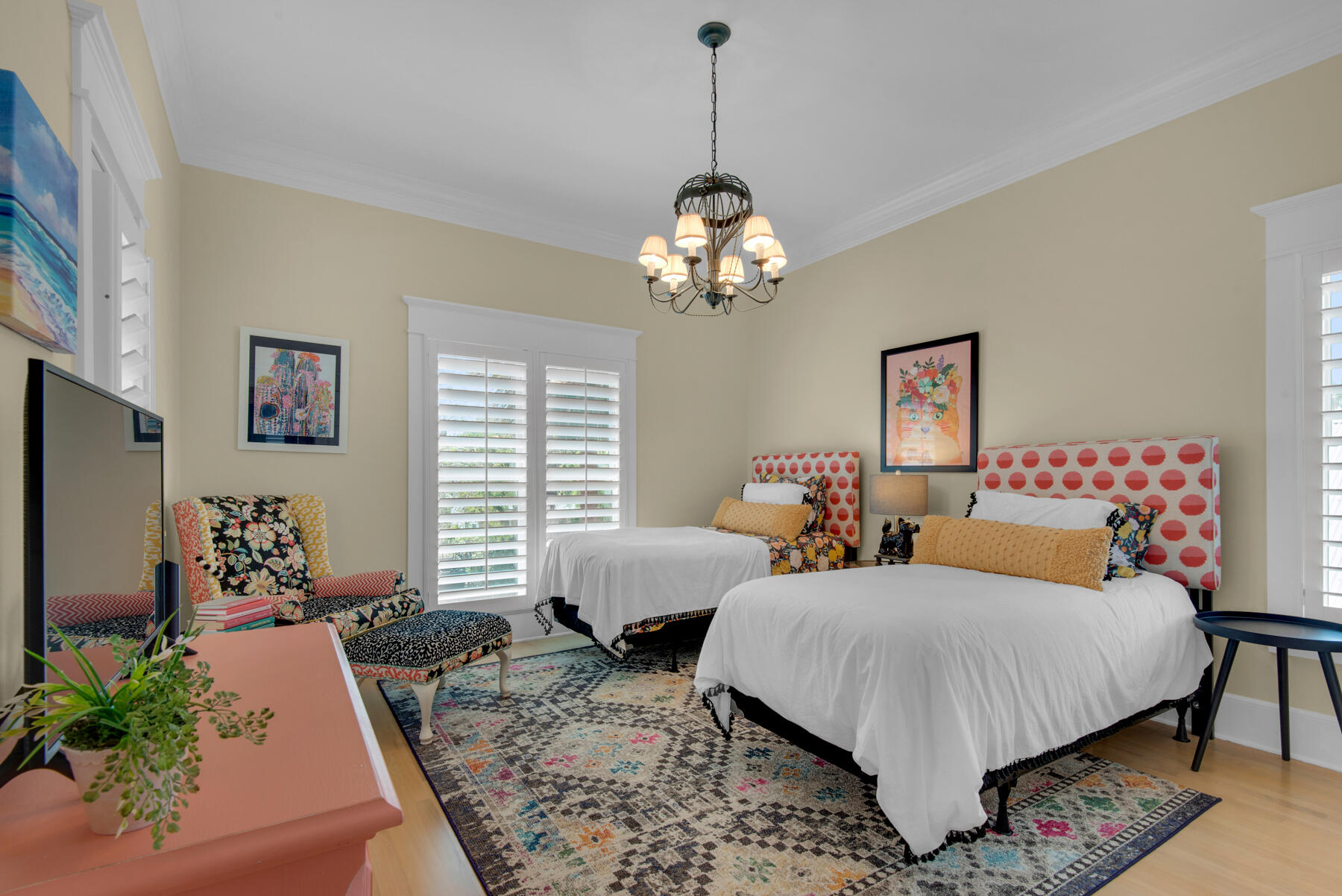 61 Rue Caribe Miramar Beach, FL 32550 - Photo 33 of 69 a bedroom with bed and a chandelier