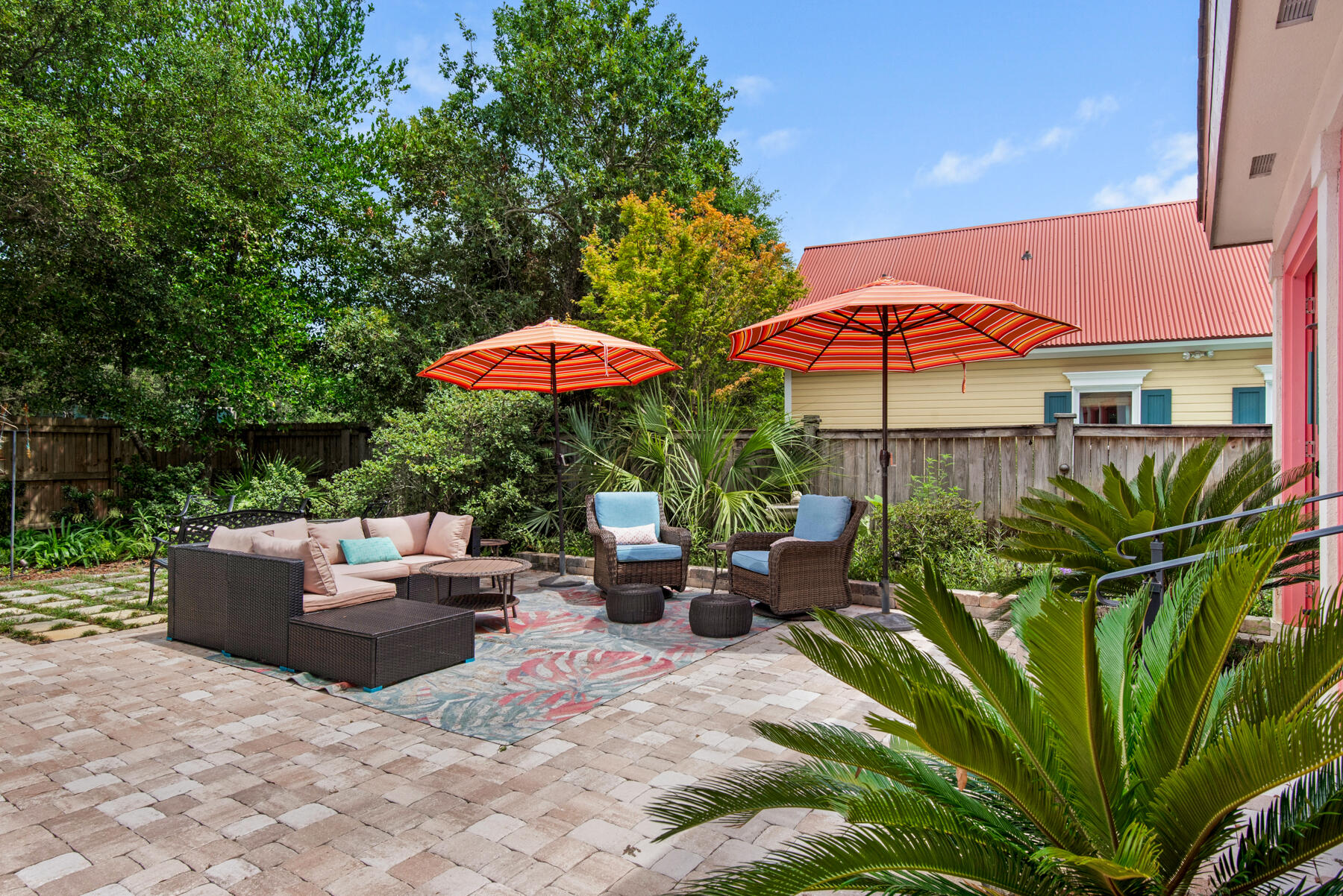61 Rue Caribe Miramar Beach, FL 32550 - Photo 43 of 69 a view of a patio with chairs and a potted plant