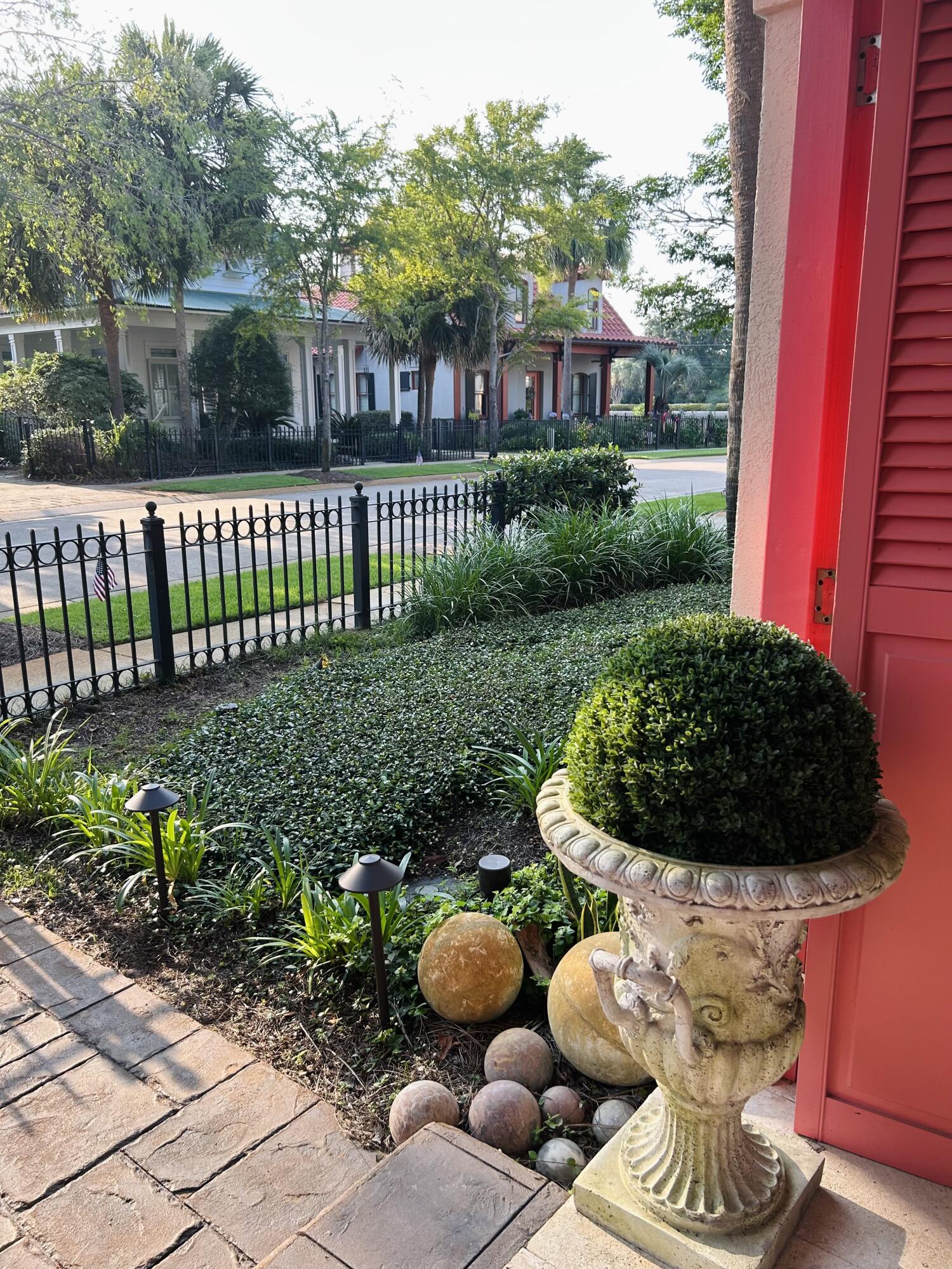 61 Rue Caribe Miramar Beach, FL 32550 - Photo 5 of 69 a front view of a house with a yard