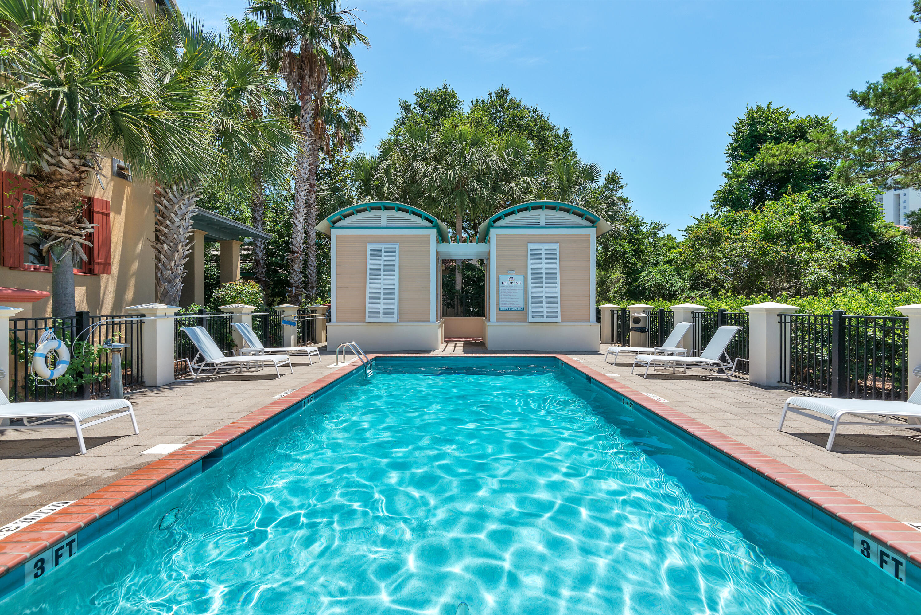 61 Rue Caribe Miramar Beach, FL 32550 - Photo 57 of 69 a view of a house with swimming pool and sitting area