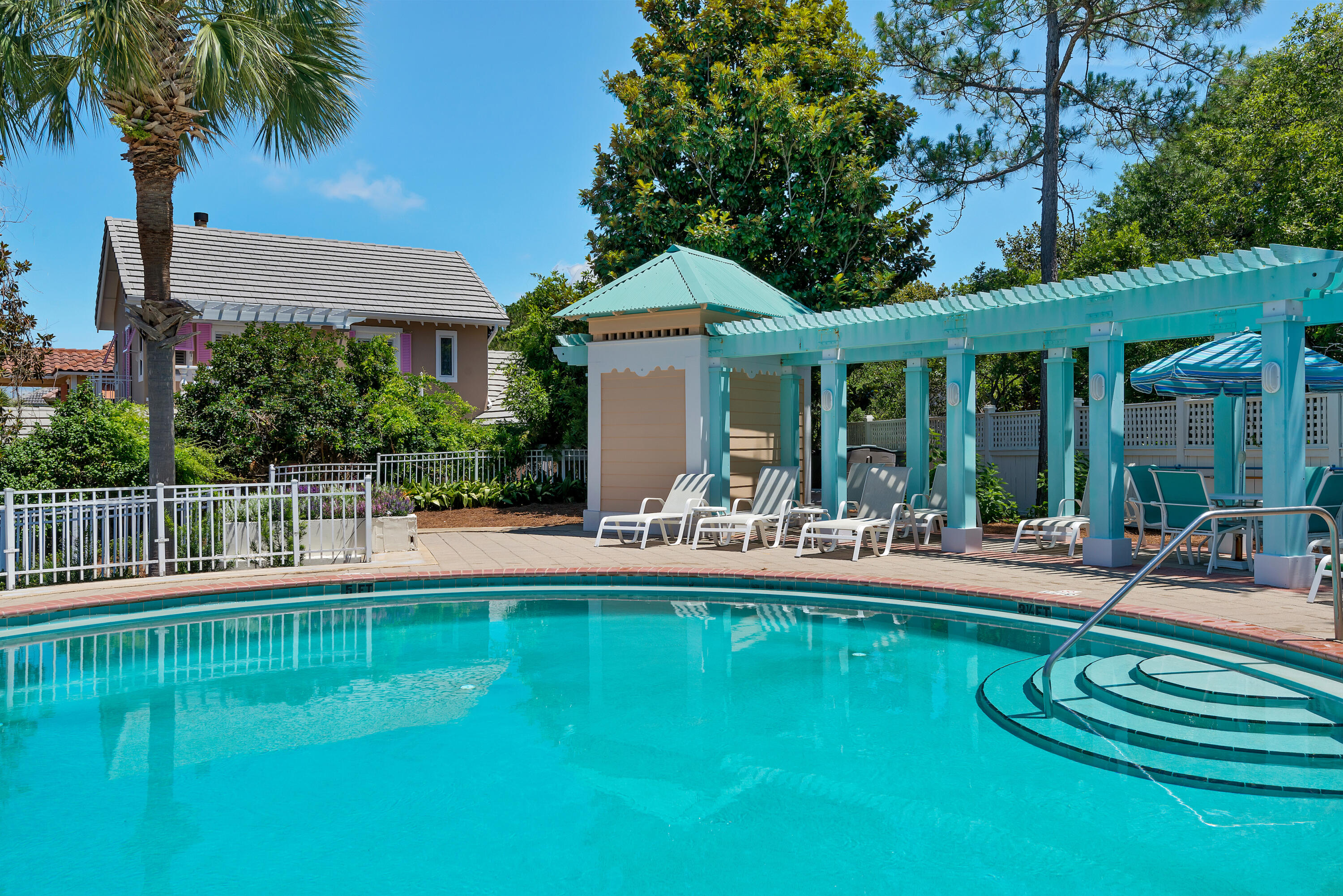 61 Rue Caribe Miramar Beach, FL 32550 - Photo 58 of 69 a view of a house with a yard patio and swimming pool