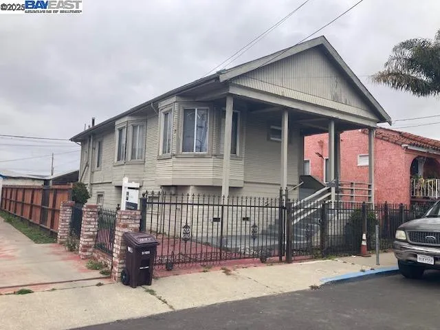 a car parked in front of a house