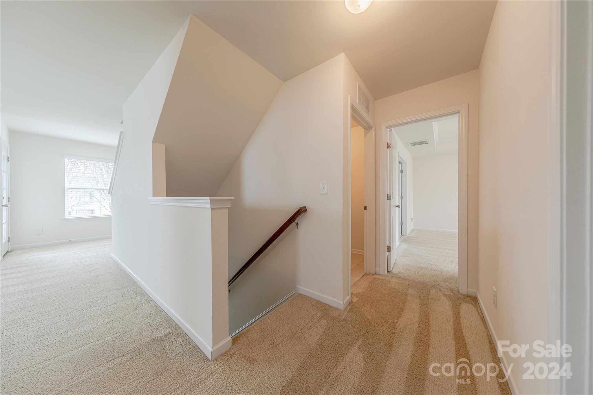 9604 Steele Meadow Road Charlotte, NC 28273 - Photo 19 of 46 a view of a hallway view with staircase
