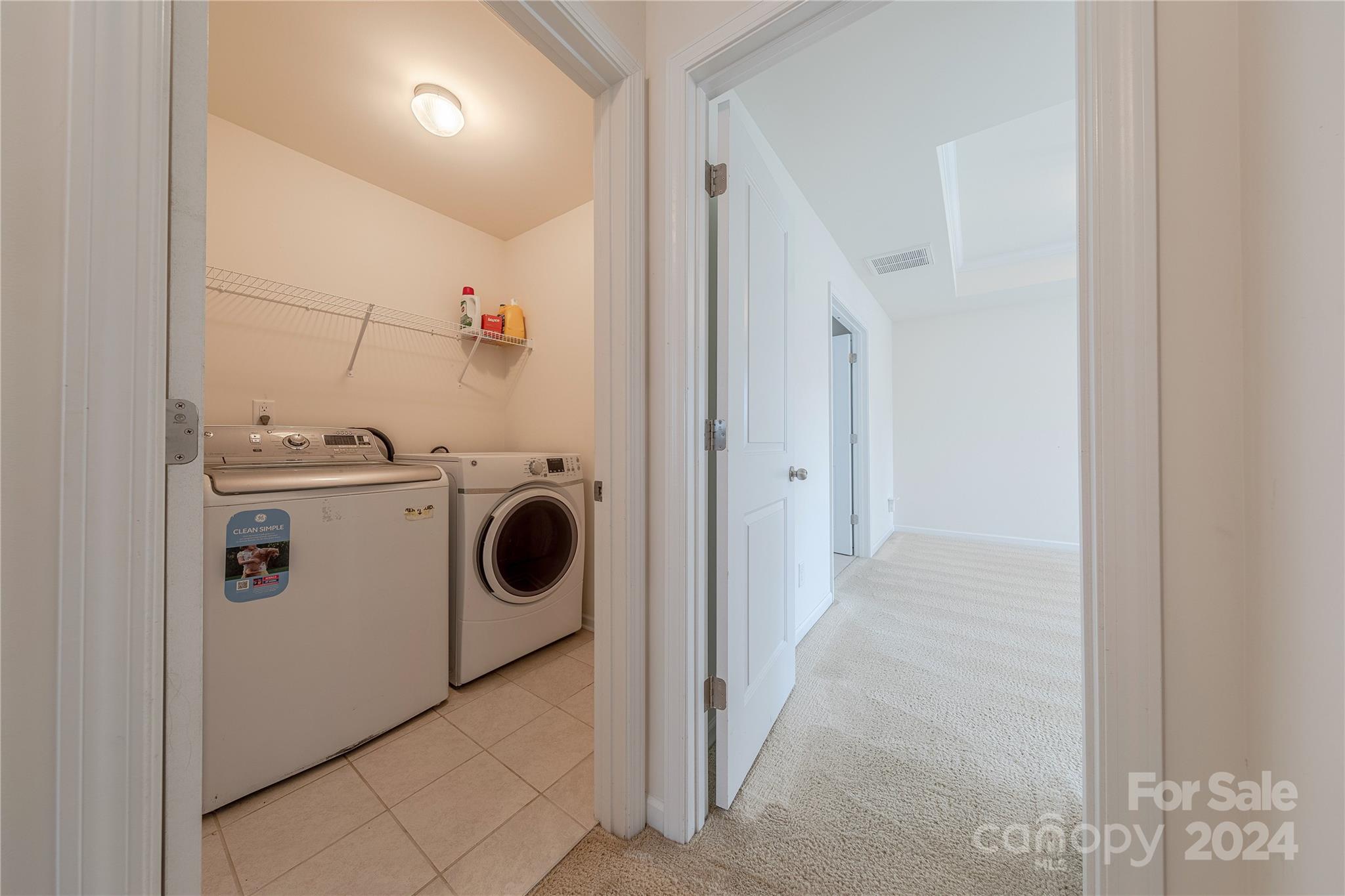 9604 Steele Meadow Road Charlotte, NC 28273 - Photo 20 of 46 a utility room with dryer and washer