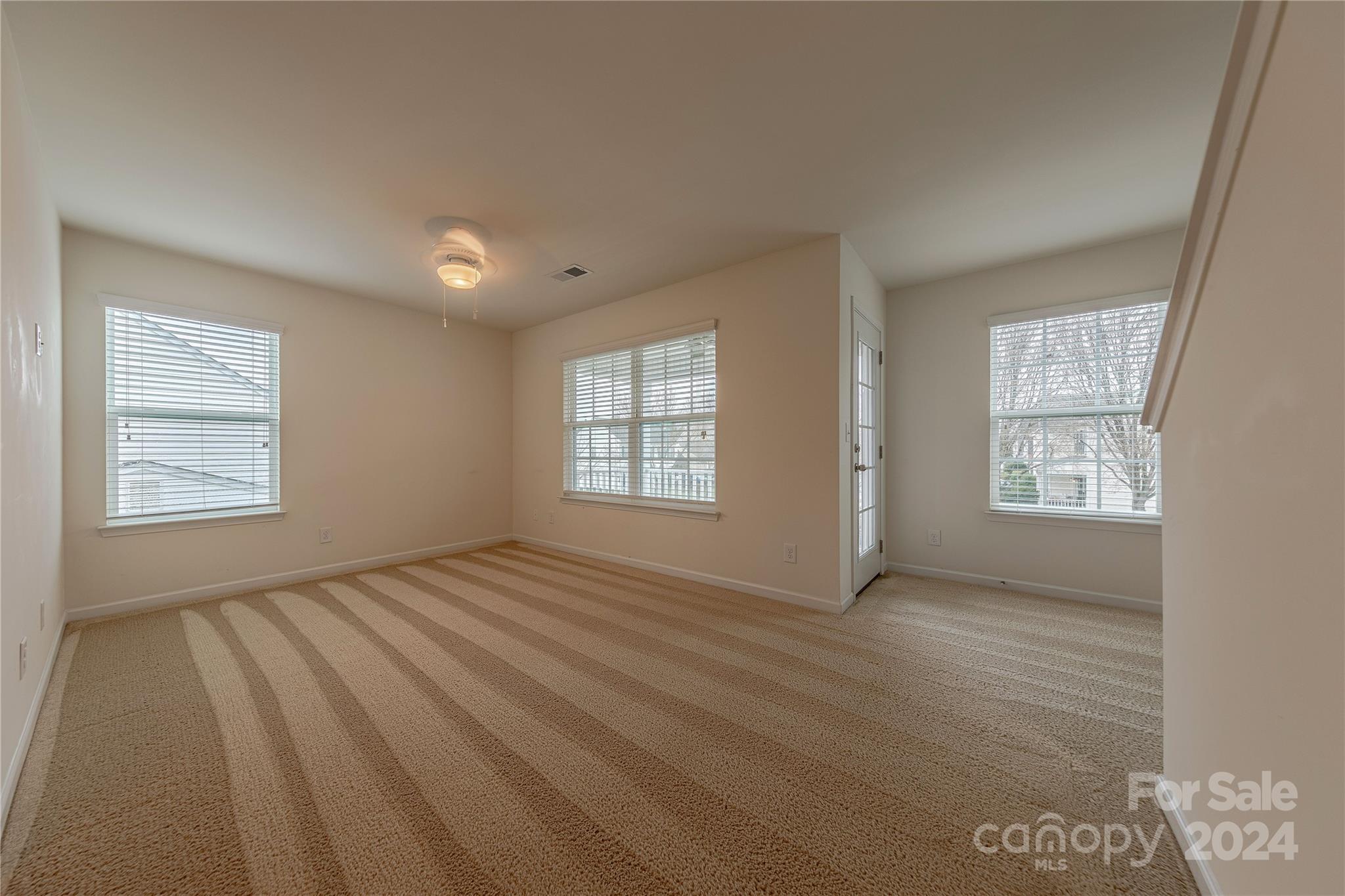 9604 Steele Meadow Road Charlotte, NC 28273 - Photo 36 of 46 a view of an empty room with a window