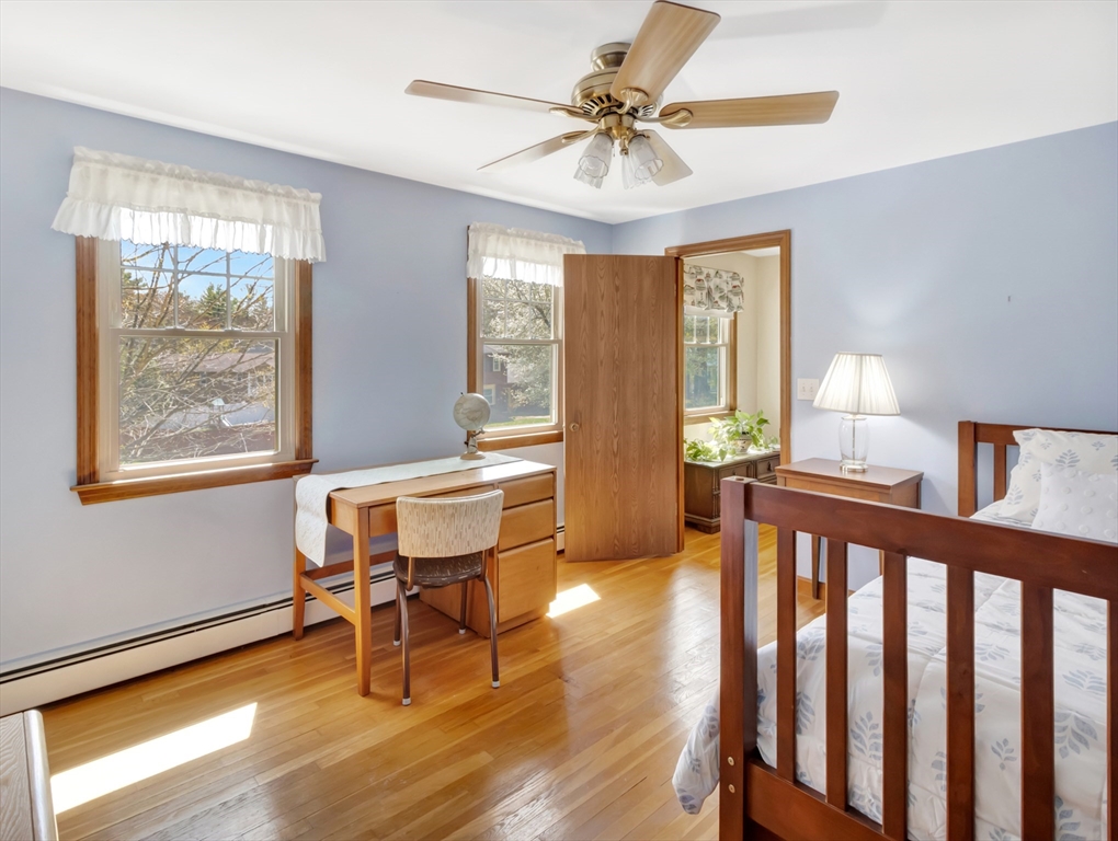 15 Riverside Drive Mansfield, MA 02048 - Photo 25 of 42 a view of a dining room with furniture window and wooden floor