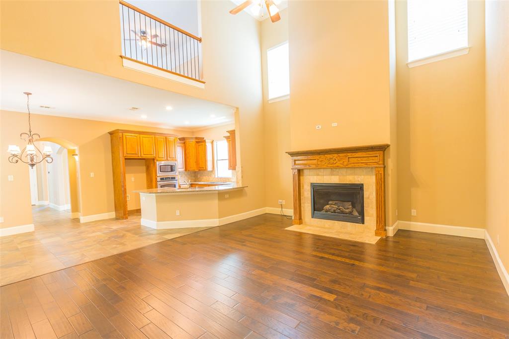 7804 Keechie Drive McKinney, TX 75070 - Photo 11 of 39 a view of a livingroom with a fireplace