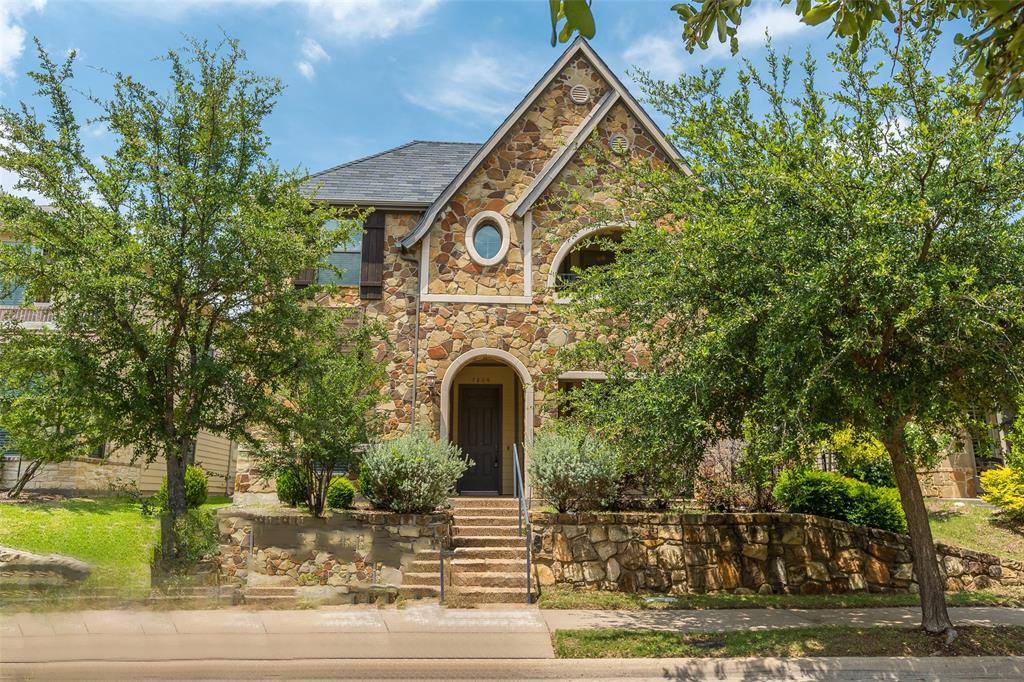 7804 Keechie Drive McKinney, TX 75070 - Photo 2 of 39 a front view of a house with garden