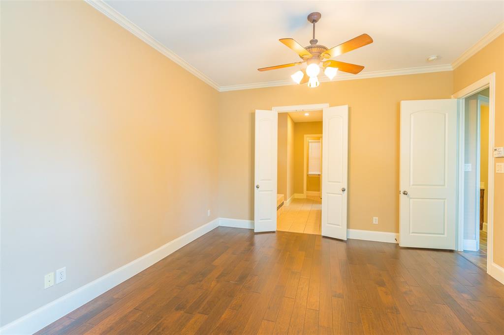 7804 Keechie Drive McKinney, TX 75070 - Photo 21 of 39 a view of empty room with wooden floor