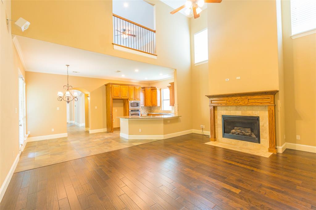 7804 Keechie Drive McKinney, TX 75070 - Photo 10 of 39 a view of a livingroom with a fireplace