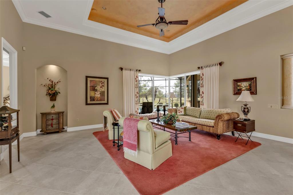 5021 Sable Key Circle Punta Gorda, FL 33955 - Photo 11 of 77 a living room with furniture and a chandelier