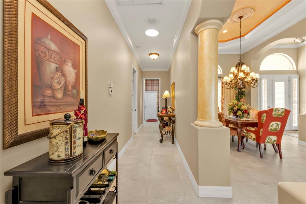 5021 Sable Key Circle Punta Gorda, FL 33955 - Photo 14 of 77 a view of a dining room with furniture and a chandelier