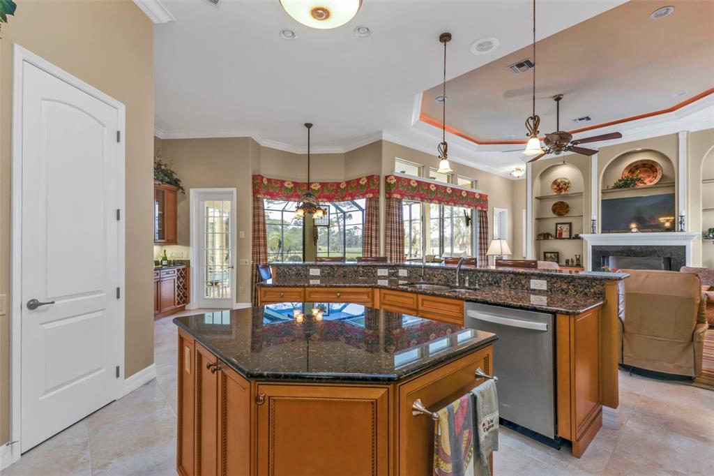 5021 Sable Key Circle Punta Gorda, FL 33955 - Photo 27 of 77 a room with stainless steel appliances granite countertop a sink and a cabinets