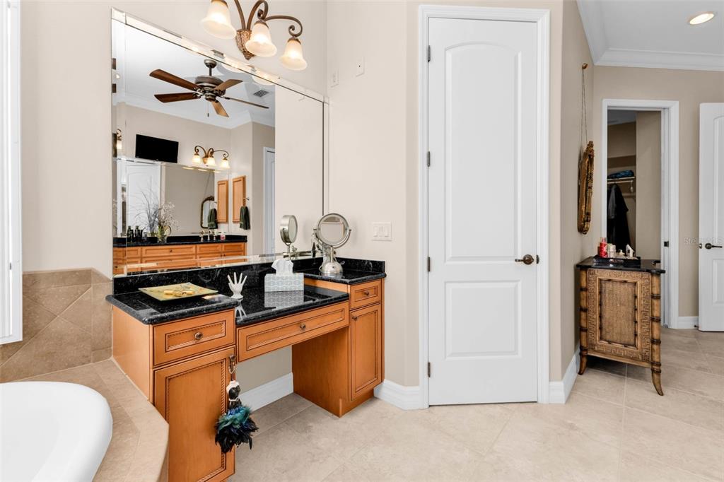 5021 Sable Key Circle Punta Gorda, FL 33955 - Photo 44 of 77 a kitchen with stainless steel appliances granite countertop a stove a sink and a refrigerator