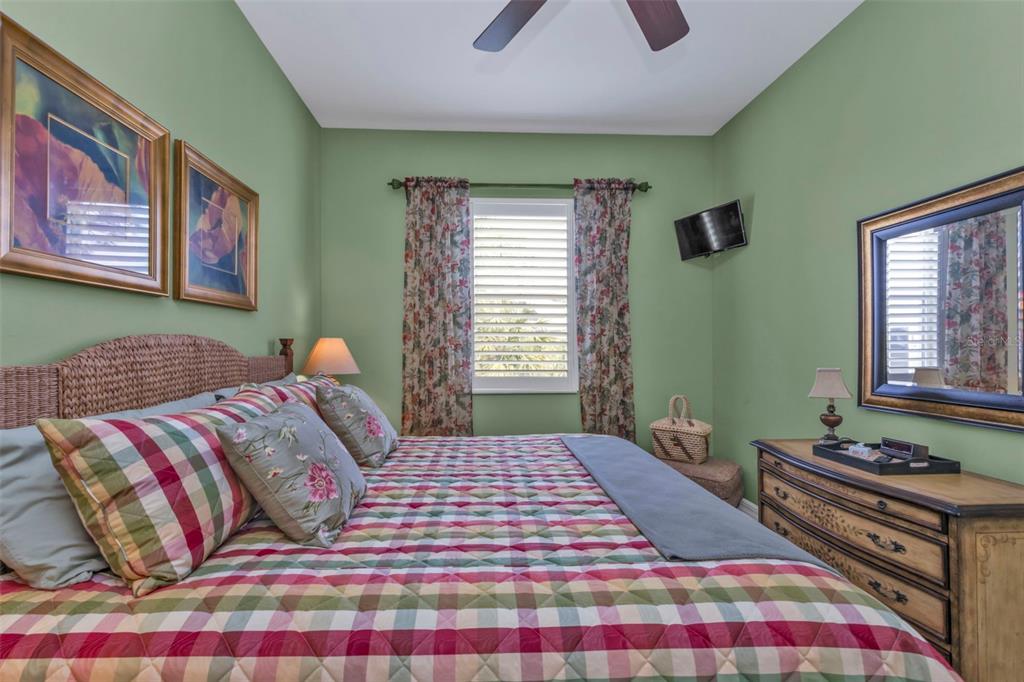5021 Sable Key Circle Punta Gorda, FL 33955 - Photo 50 of 77 a bedroom with a bed and a window