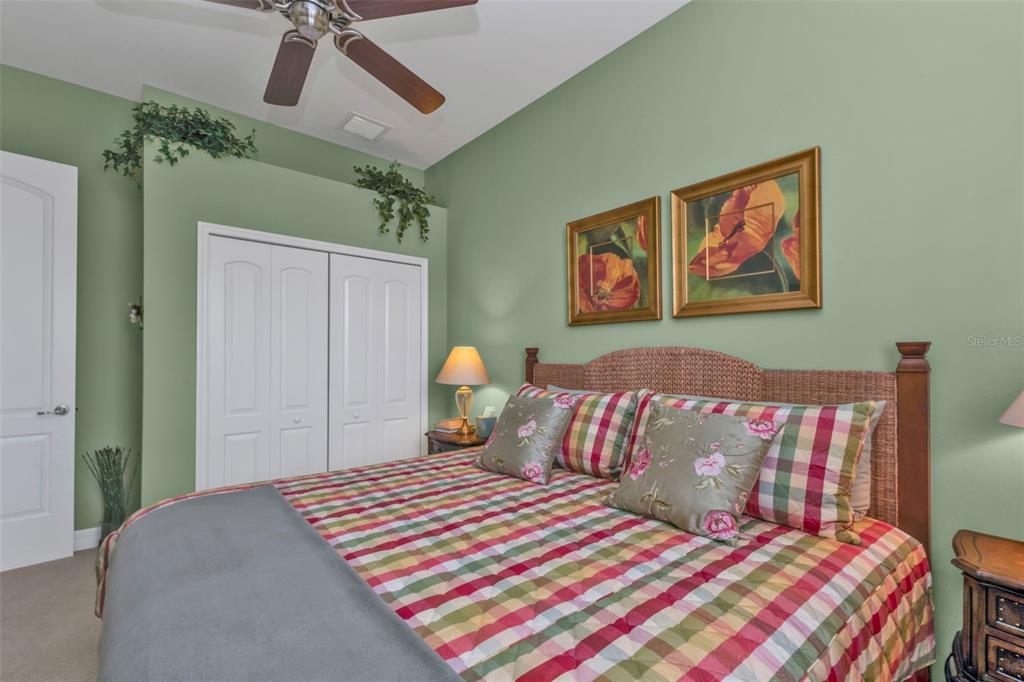 5021 Sable Key Circle Punta Gorda, FL 33955 - Photo 51 of 77 a bedroom with a bed and a painting on the wall