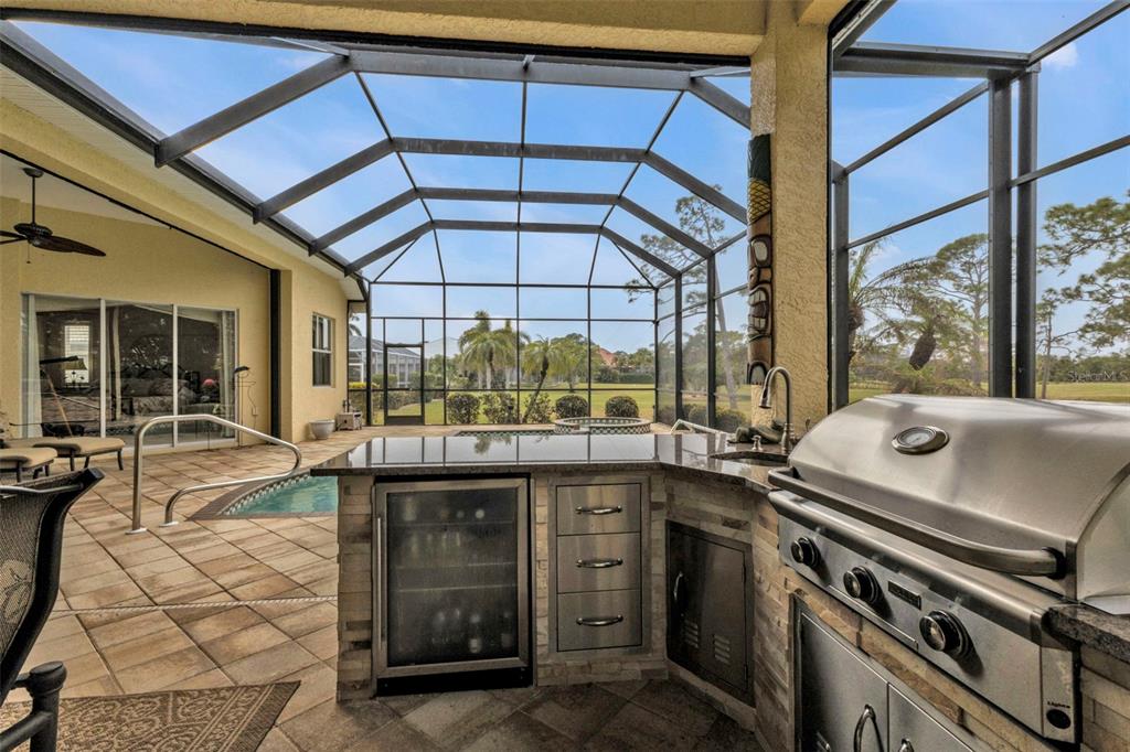 5021 Sable Key Circle Punta Gorda, FL 33955 - Photo 59 of 77 a kitchen with a stove and a sink