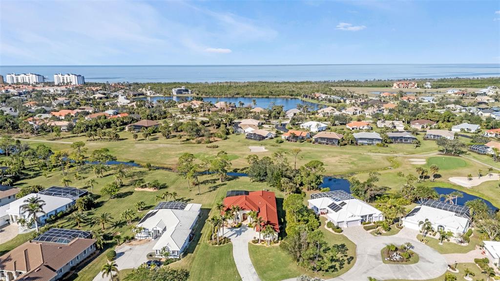 5021 Sable Key Circle Punta Gorda, FL 33955 - Photo 71 of 77 an aerial view of ocean and residential houses with outdoor space