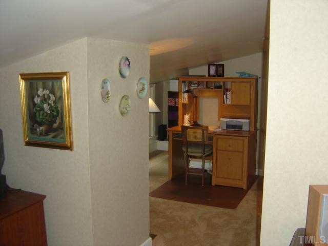 911 Brooks Avenue Raleigh, NC 27607 - Photo 11 of 12 Another view of the master suite upstairs going towards the computer area and master bath. Great storage area. Master Suite