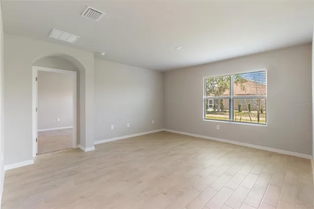 an empty room with windows