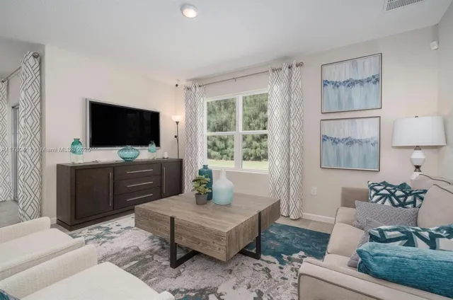 a bedroom with a bed and dresser