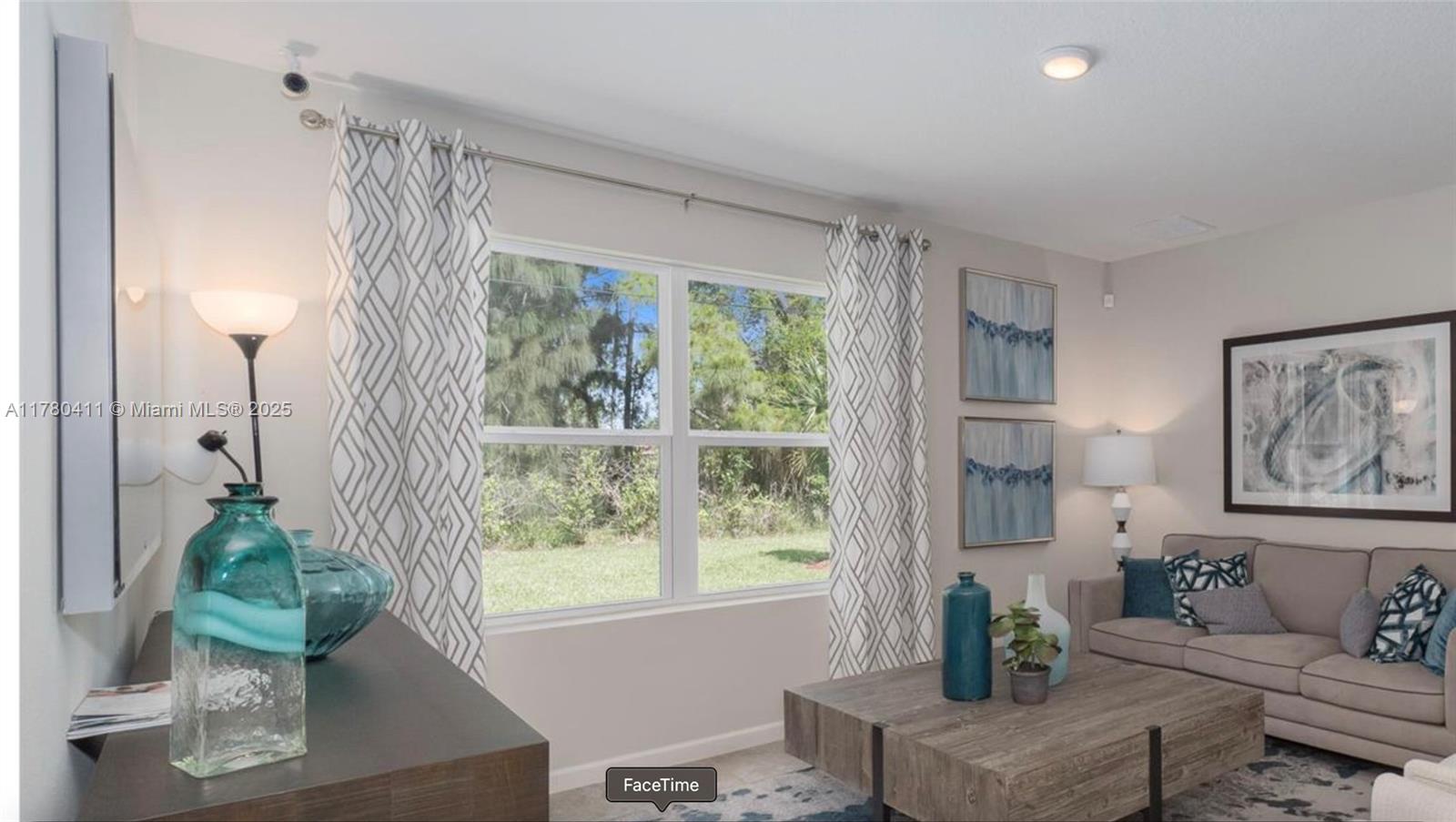 3743 Southwest Port St Lucie Boulevard Port St. Lucie, FL 34953 - Photo 21 of 22 a living room with furniture and a window