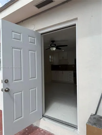 a bathroom with a toilet sink and shower