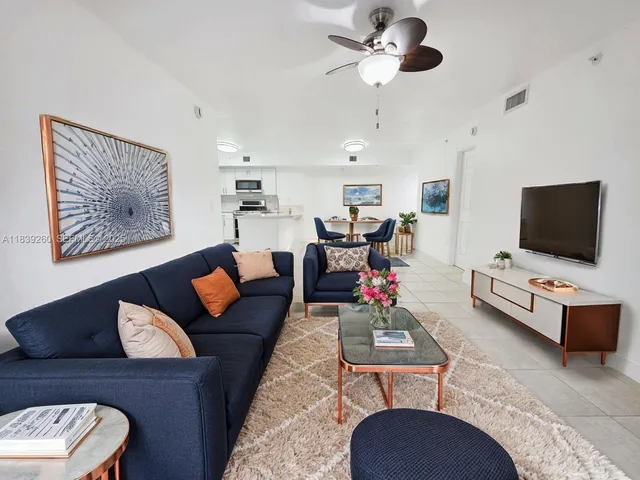 a kitchen with a sink stove and microwave