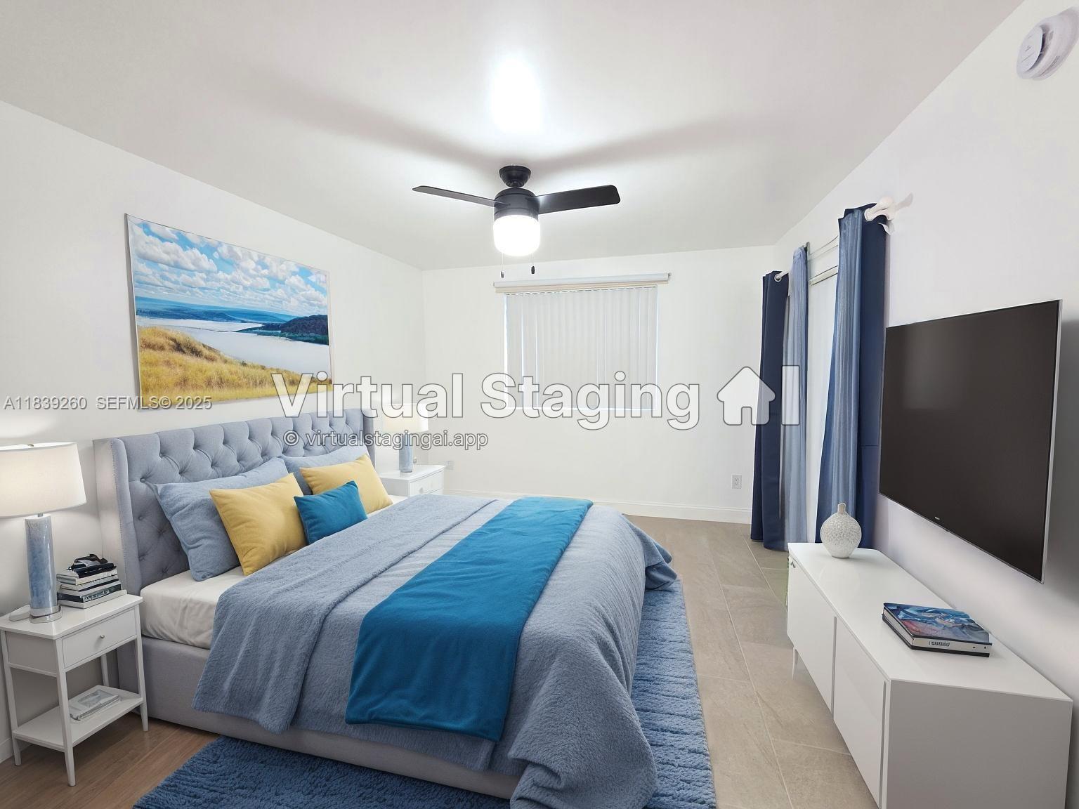 2620 South University Drive, Unit 111 Davie, FL 33328 - Photo 2 of 49 a bedroom with a bed and a flat screen tv