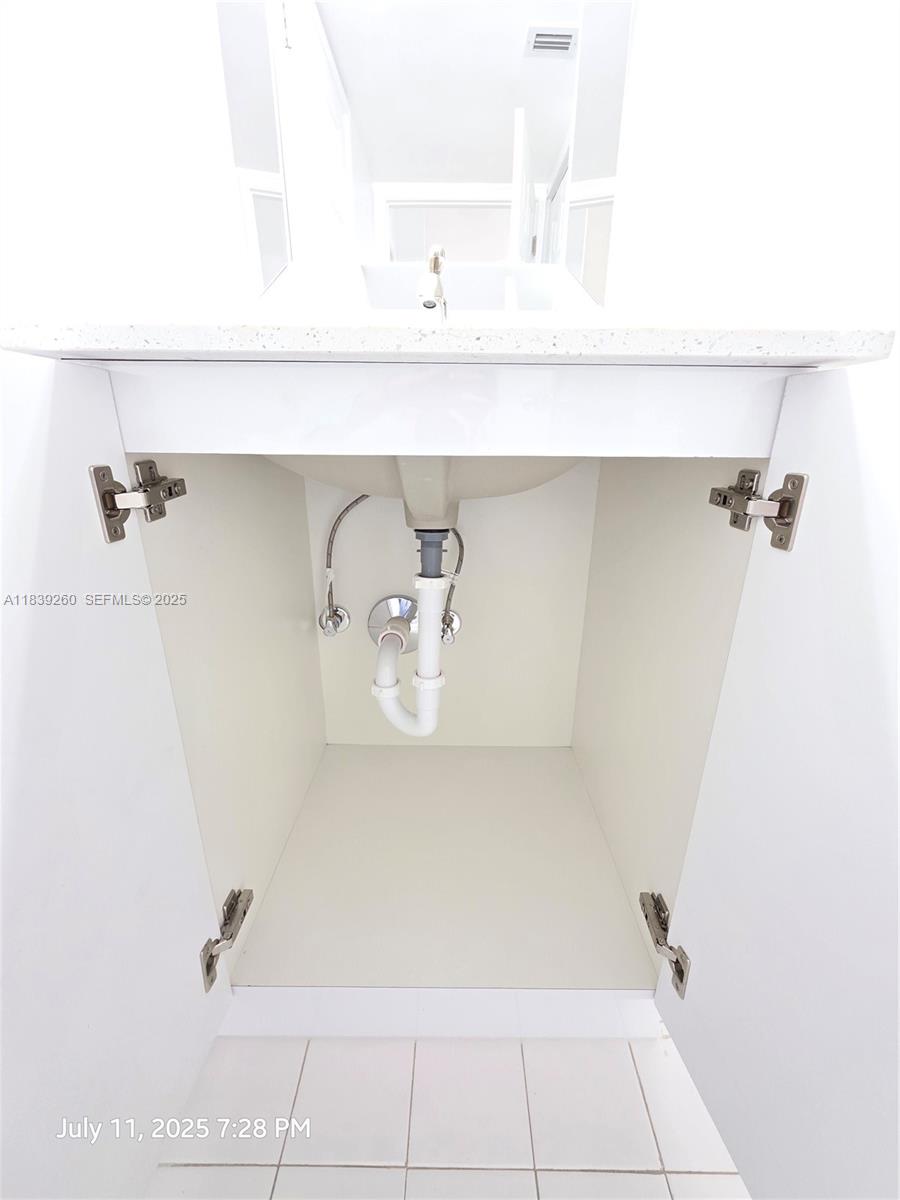 2620 South University Drive, Unit 111 Davie, FL 33328 - Photo 32 of 49 2nd Bedroom Sink