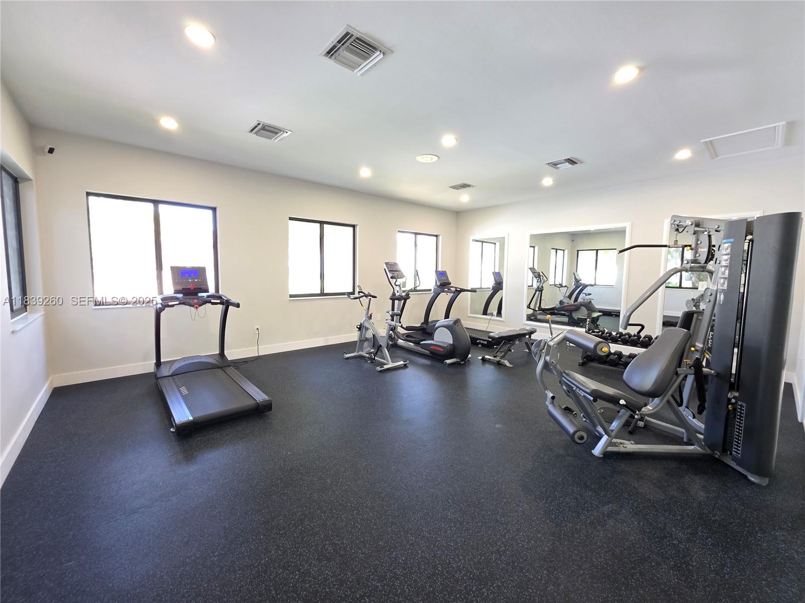 2620 South University Drive, Unit 111 Davie, FL 33328 - Photo 42 of 49 a view of a room with gym equipment