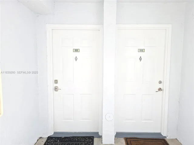 a bathroom with a mirror and a shower