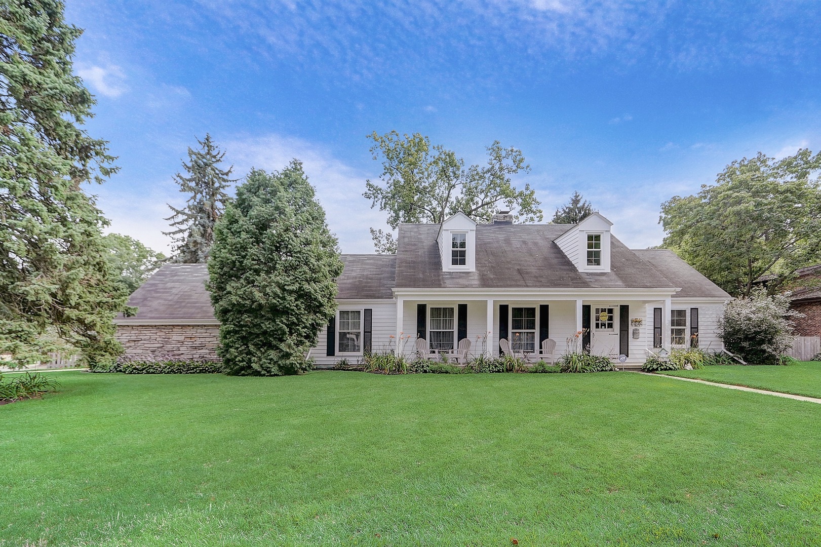 115 Sheridan Court East Waukegan, IL 60085 - Photo 1 of 22 a front view of a house with a garden