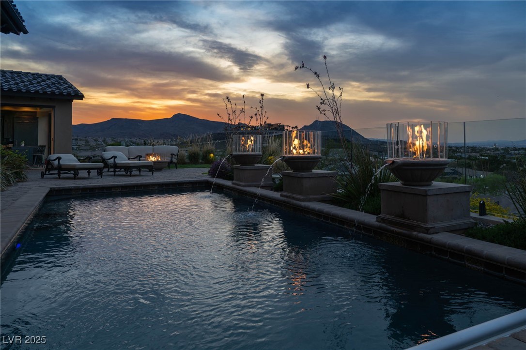 1123 Christian Road Henderson, NV 89002 - Photo 18 of 83 Outdoor pool with a mountain view, city views, fire/water features