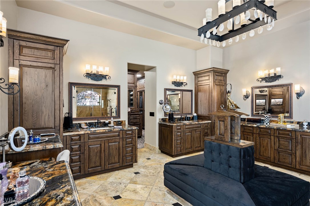 1123 Christian Road Henderson, NV 89002 - Photo 52 of 83 Full bathroom featuring two vanities and a sink