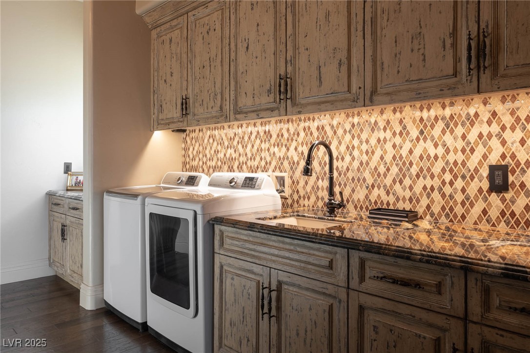 1123 Christian Road Henderson, NV 89002 - Photo 57 of 83 Primary bedroom has its own laundry area a sink, dark wood-type flooring, cabinet space, and washing machine and clothes dryer