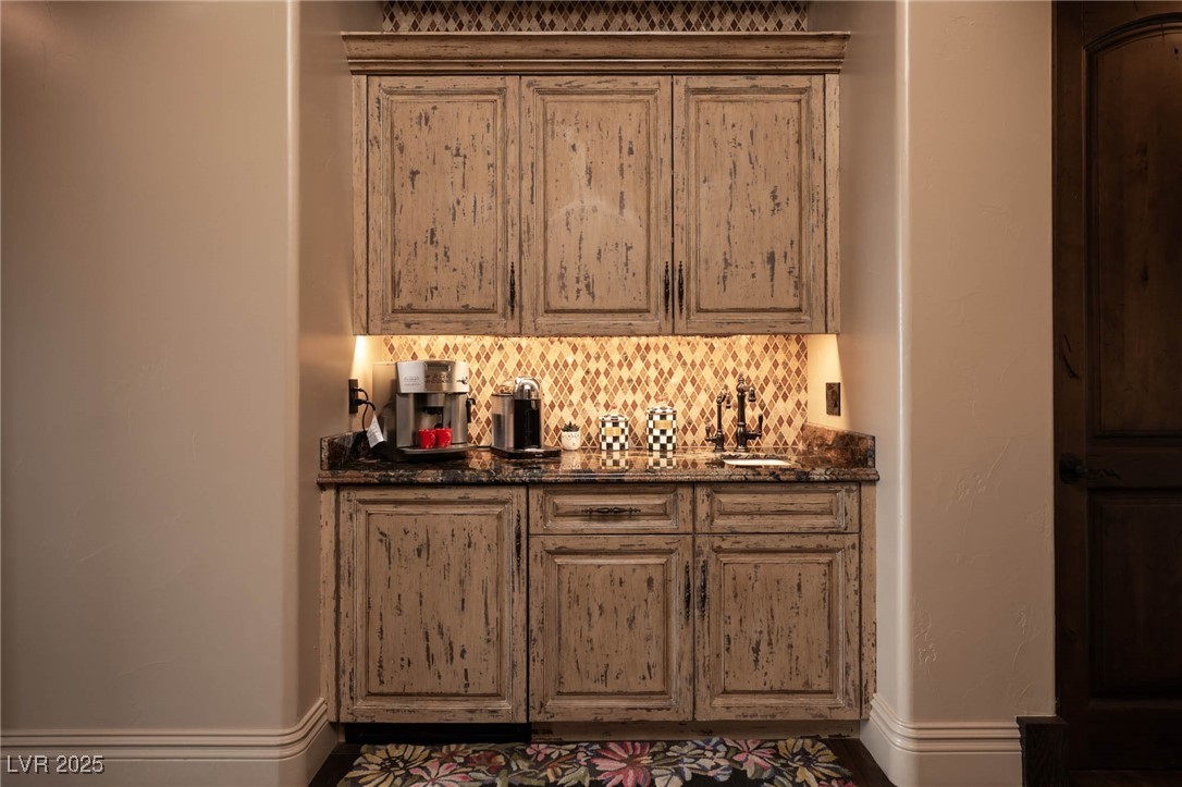 1123 Christian Road Henderson, NV 89002 - Photo 58 of 83 Coffe Bar with tasteful backsplash, wet bar, and a sink in the primary bedroom