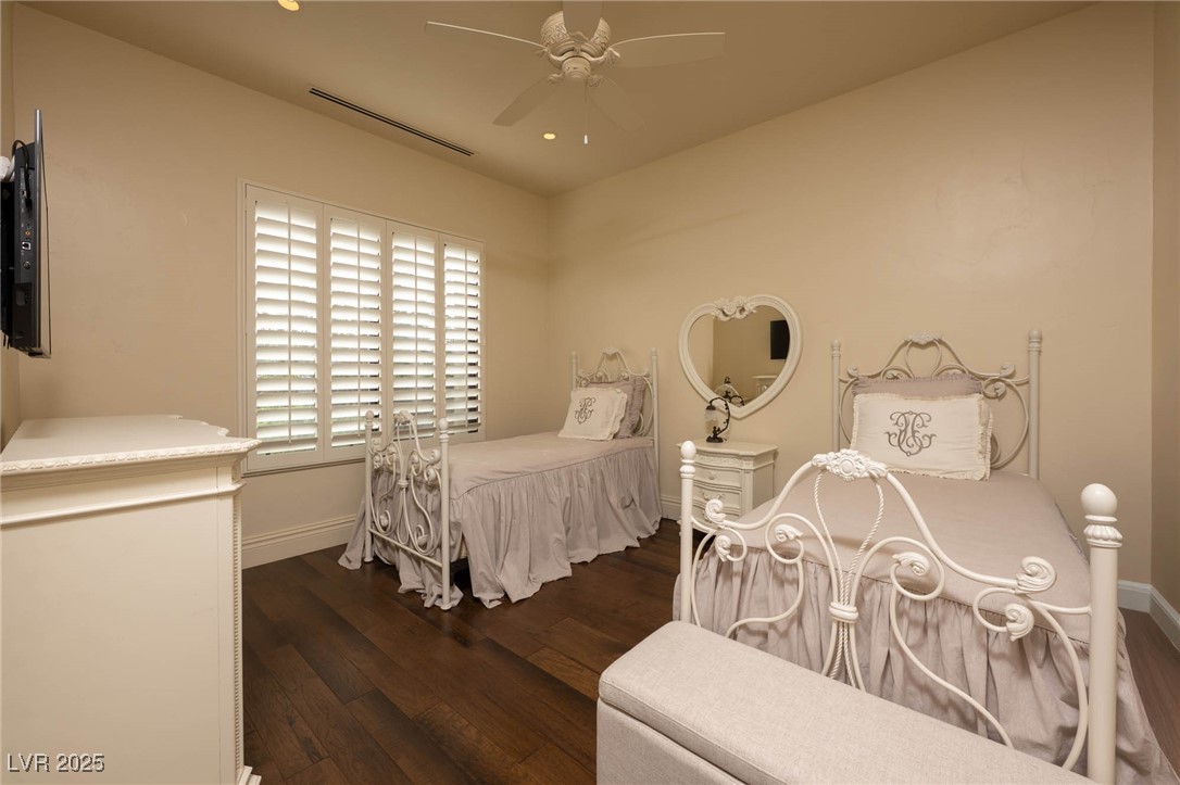 1123 Christian Road Henderson, NV 89002 - Photo 70 of 83 Bedroom featuring dark wood-type flooring, baseboards, and a ceiling fan
