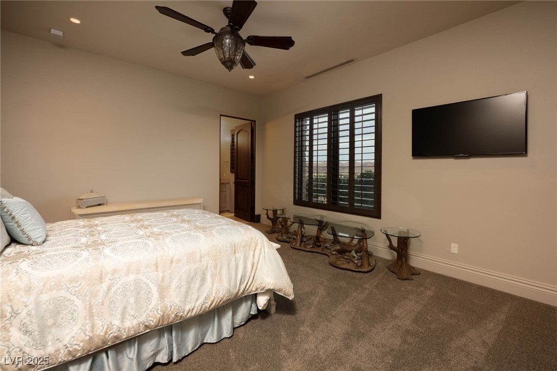 1123 Christian Road Henderson, NV 89002 - Photo 74 of 83 CASITA bedroom featuring visible vents, baseboards, ceiling fan, carpet, and recessed lighting