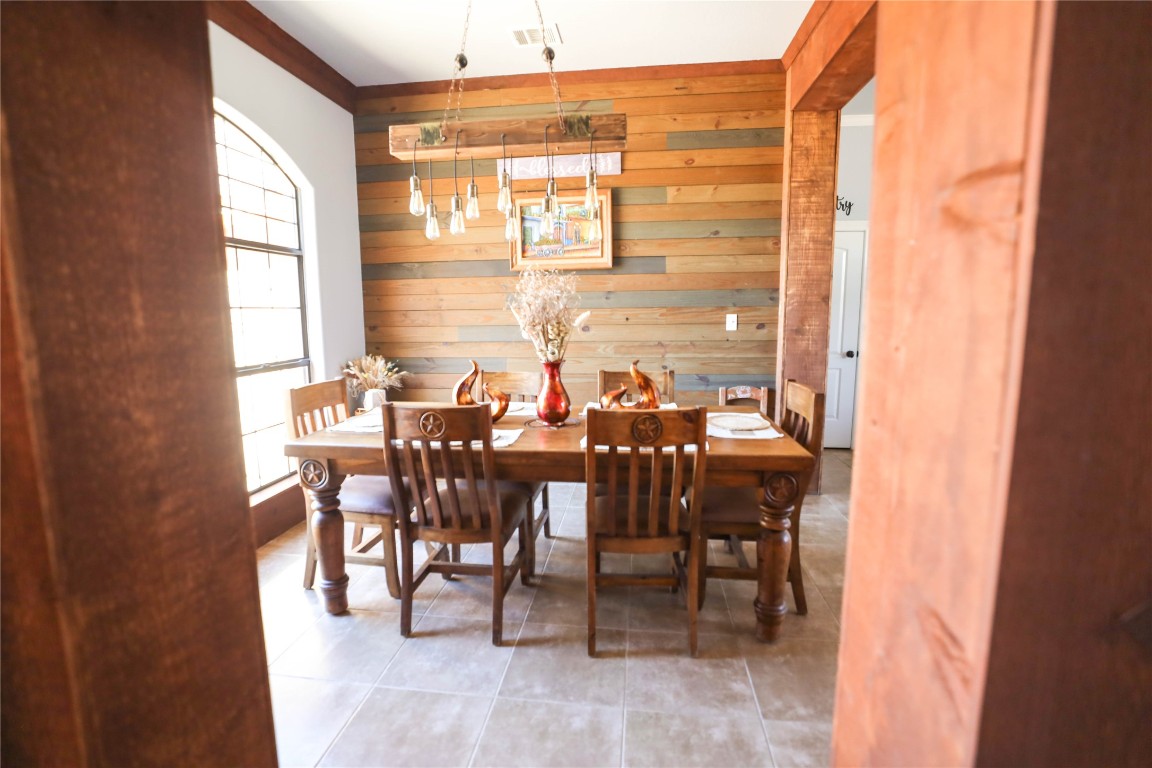 535 Upper Elgin River Road Elgin, TX 78621 - Photo 14 of 28 a view of a dining room with furniture window and outside view