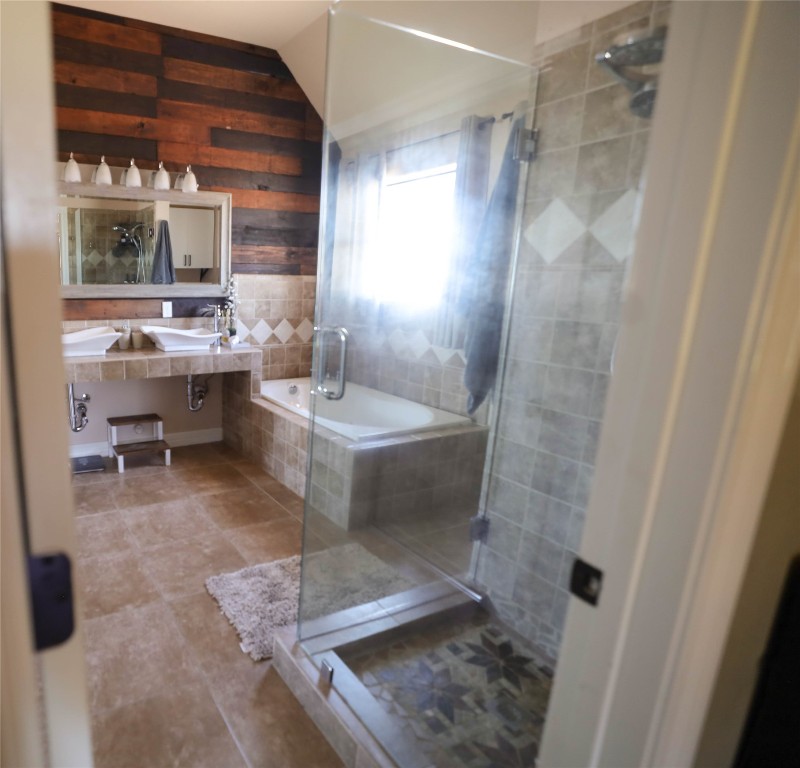535 Upper Elgin River Road Elgin, TX 78621 - Photo 20 of 28 a bathroom with a sink and mirror