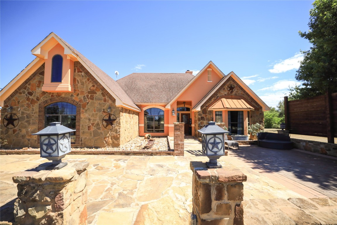 535 Upper Elgin River Road Elgin, TX 78621 - Photo 2 of 28 a front view of a house with a yard