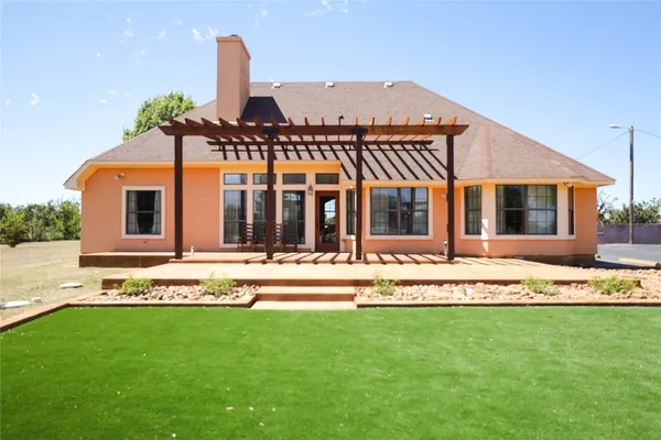 a view of a house with a swimming pool