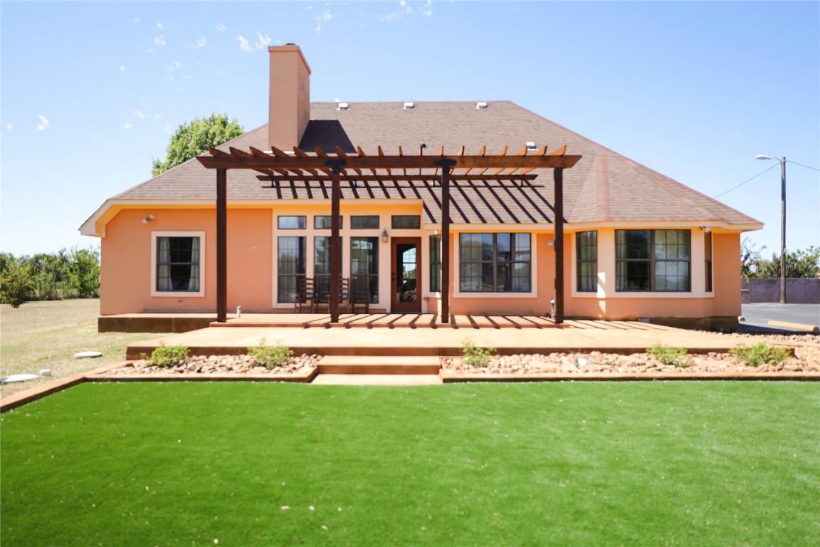535 Upper Elgin River Road Elgin, TX 78621 - Photo 5 of 28 a view of a house with a swimming pool