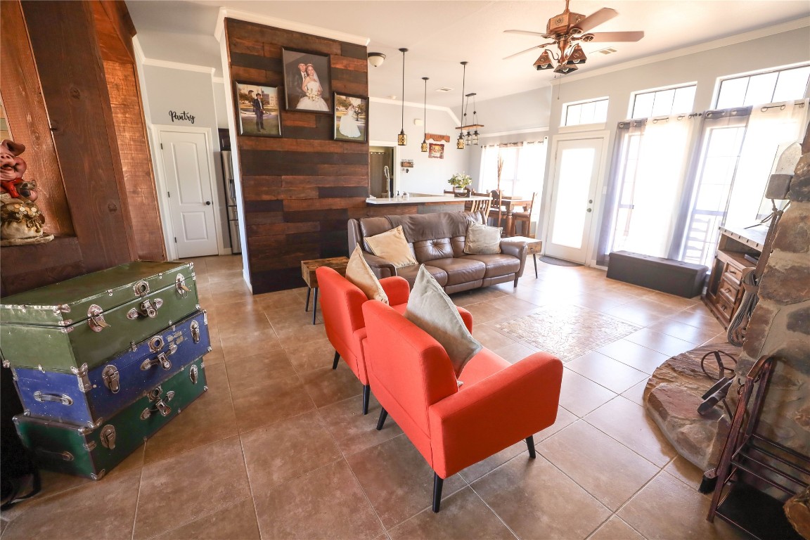 535 Upper Elgin River Road Elgin, TX 78621 - Photo 10 of 28 a living room with furniture and a large window