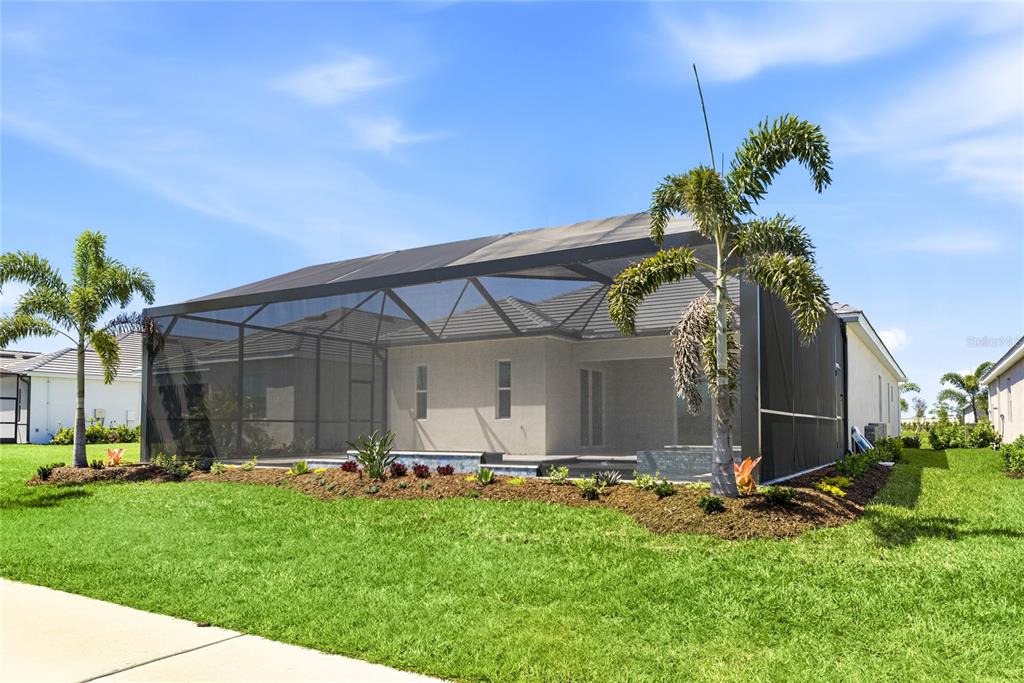 19156 Cherrystone Way Lakewood Ranch, FL 34211 - Photo 34 of 49 a view of a backyard