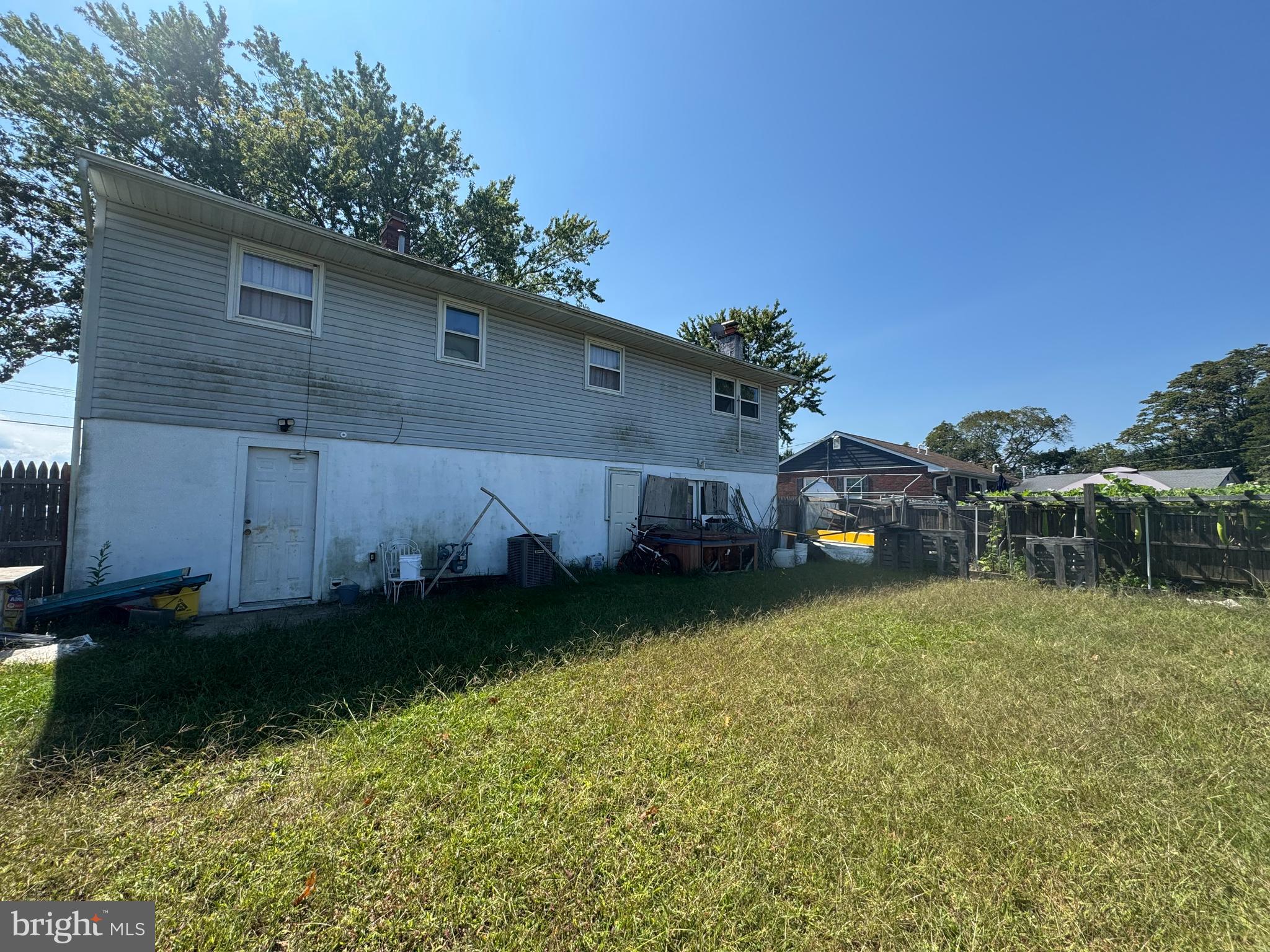 26 Nicholas Street Pemberton, NJ 08068 - Photo 6 of 7 a front view of a house with garden